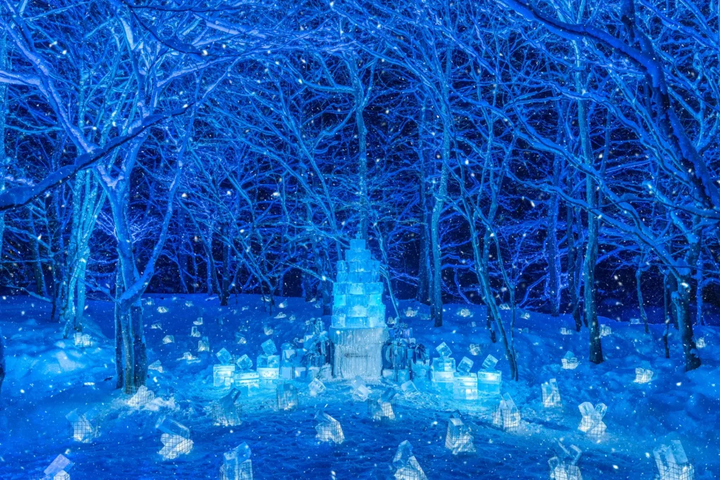 Illuminated Cristmas Tree Made of Ice Waterfall