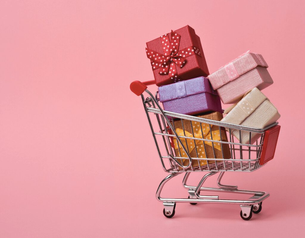 a shopping cart full of presents