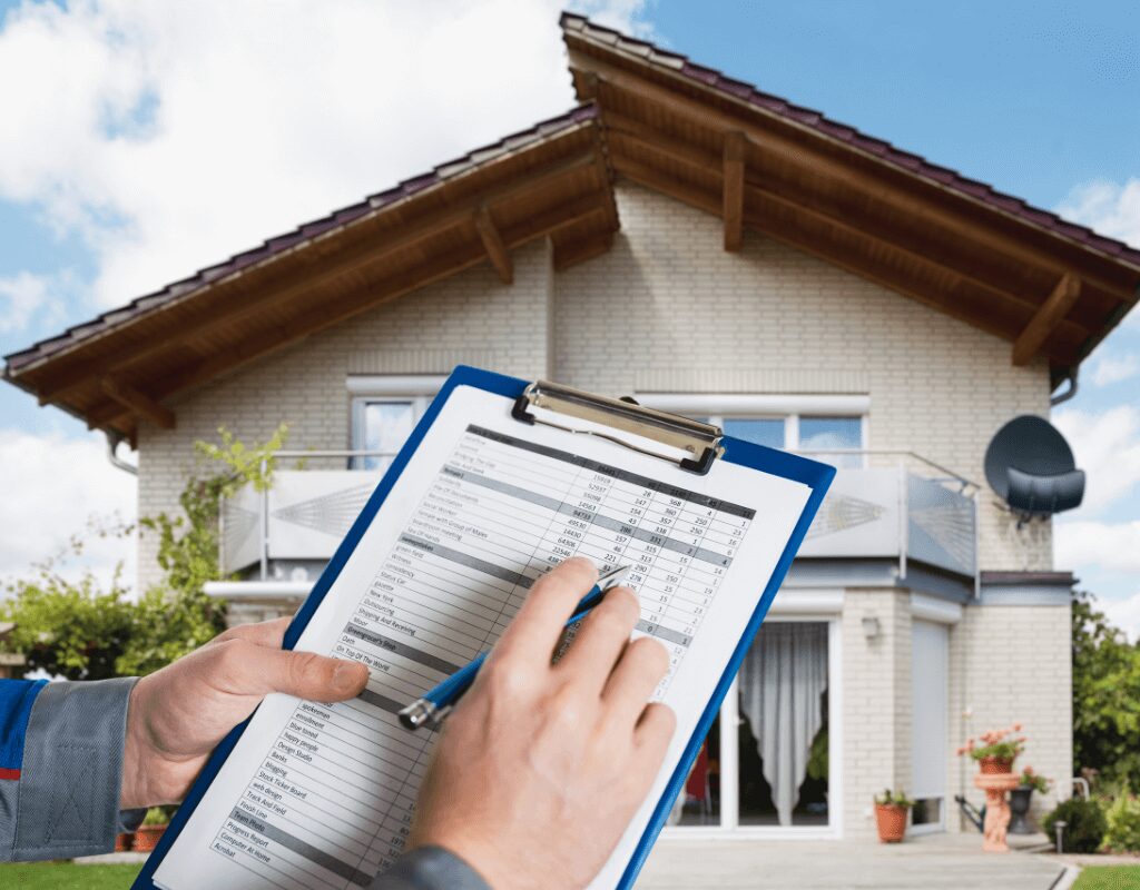 a person holding a clipboard and pen in front of a house