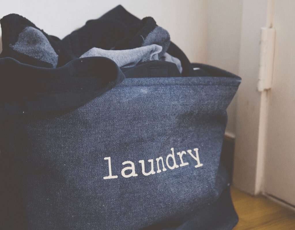 a laundry basket full of clothes