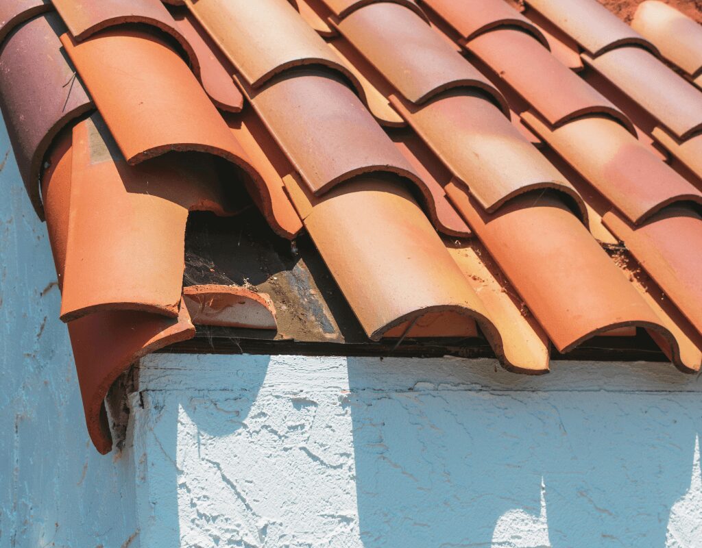 a close up of a damaged roof