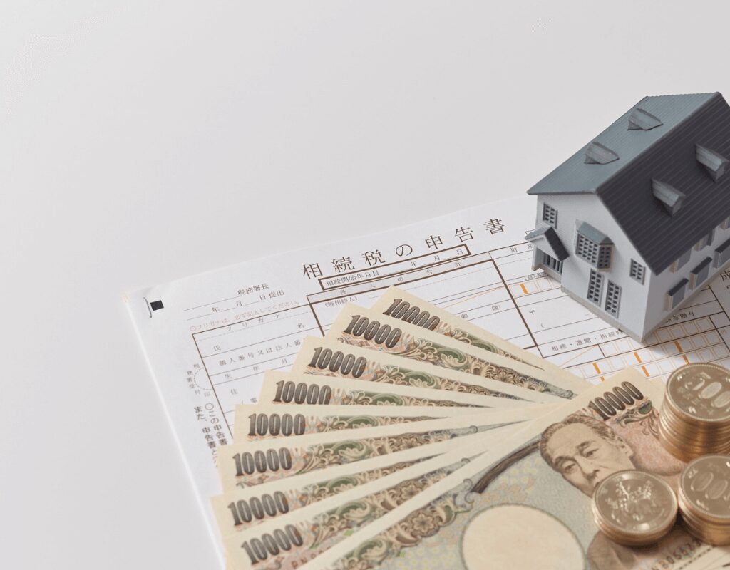 a house and money on a table